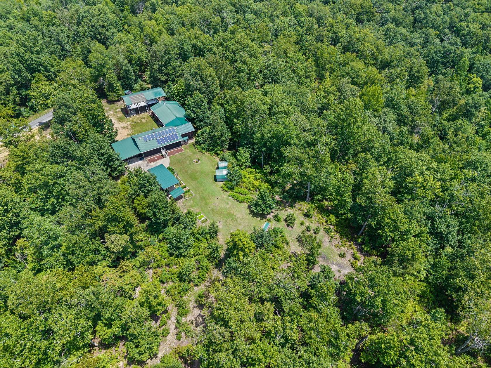 15.2 Acres of Land with Home for Sale in Linden, Tennessee