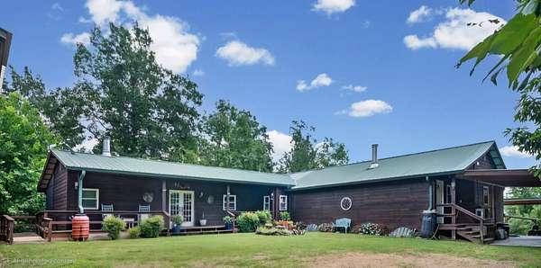 15.2 Acres of Land with Home for Sale in Linden, Tennessee