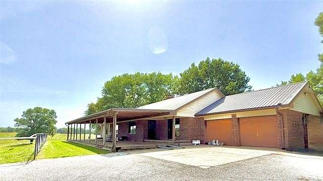 130 Acres of Agricultural Land with Home for Sale in Webbers Falls, Oklahoma
