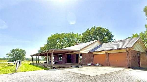 130 Acres of Agricultural Land with Home for Sale in Webbers Falls, Oklahoma