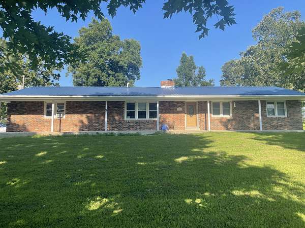 9 Acres of Land with Home for Sale in Dunnegan, Missouri