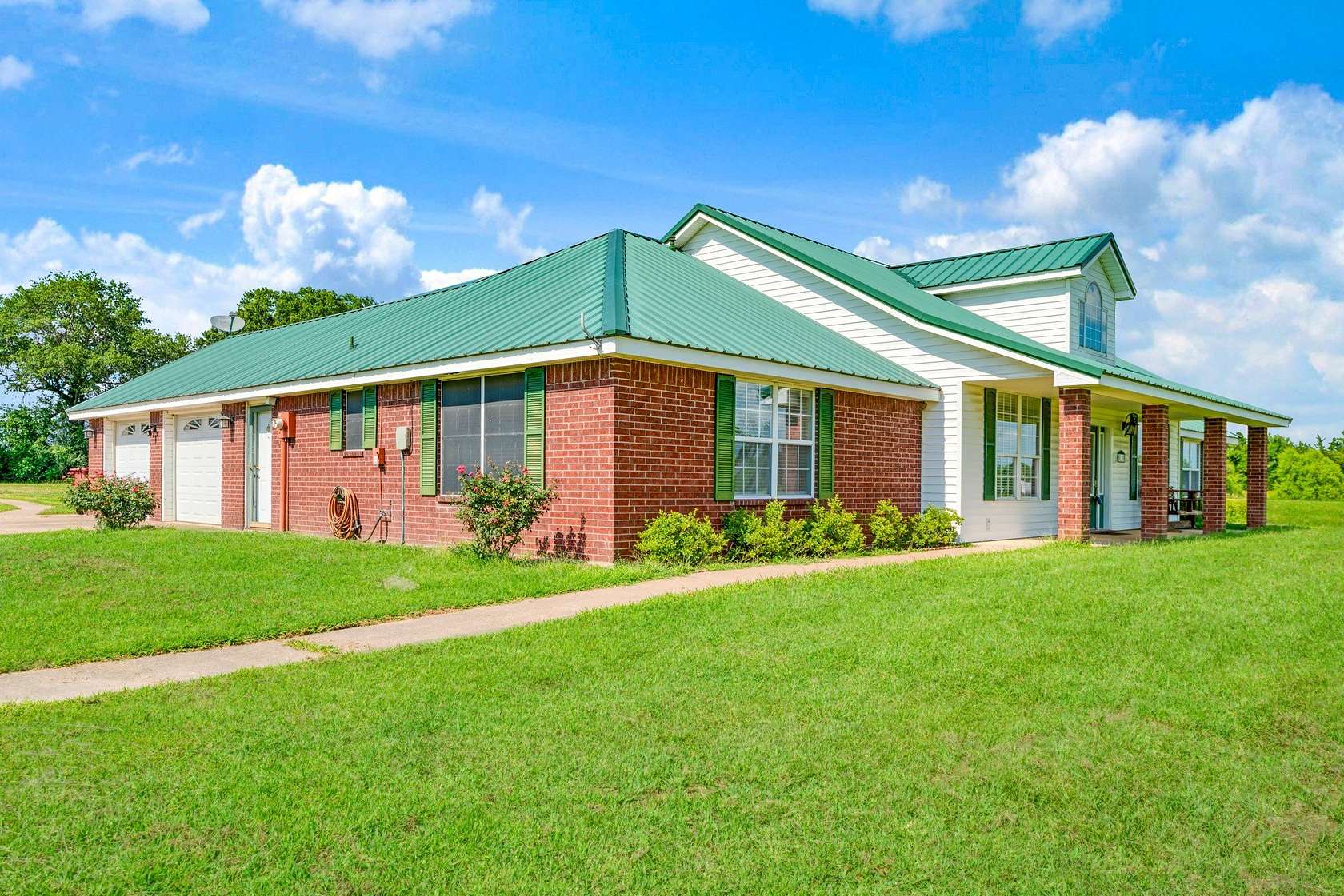 12.2 Acres of Recreational Land with Home for Sale in Blossom, Texas