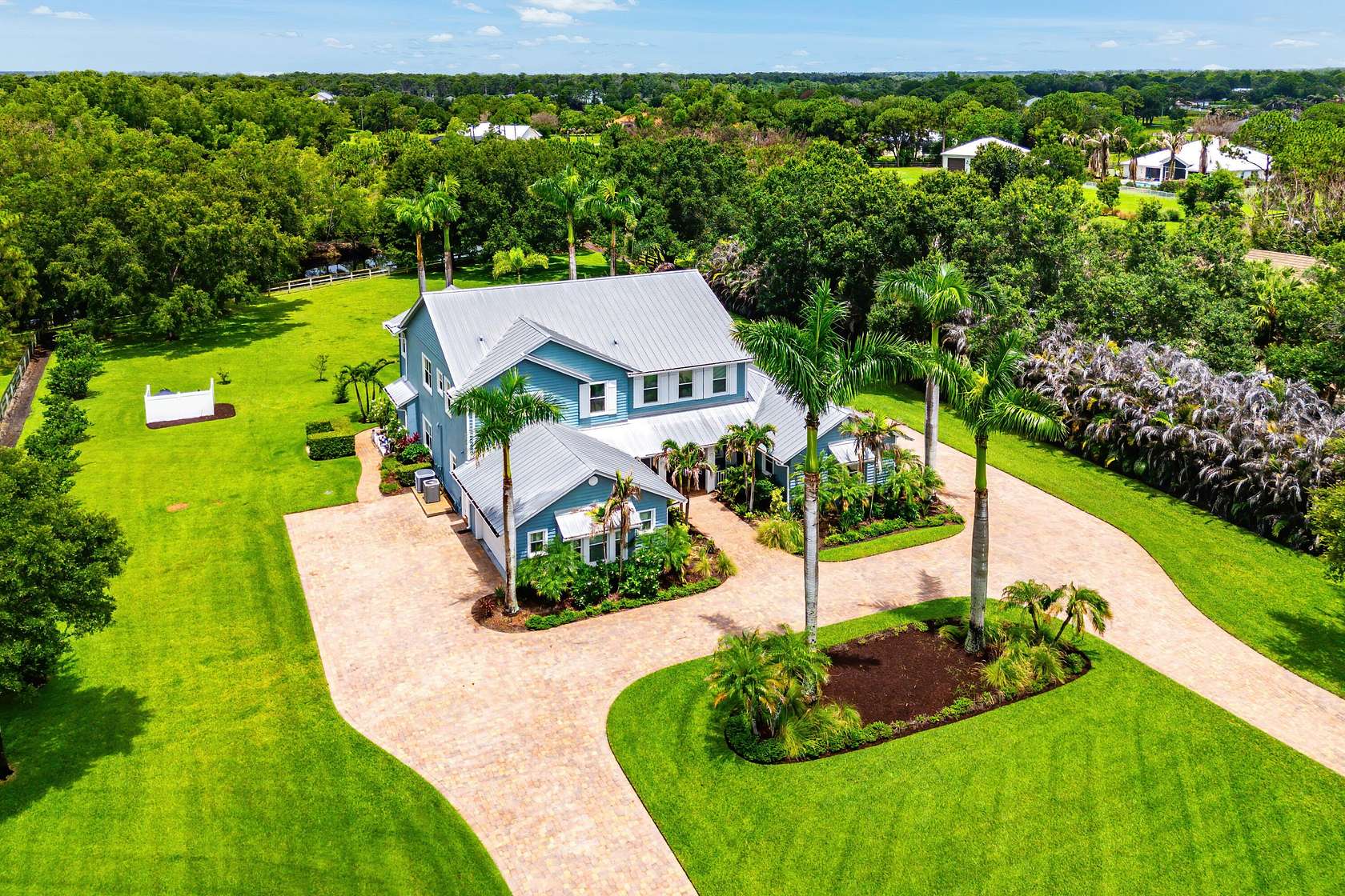 2 Acres of Land with Home for Sale in Palm City, Florida