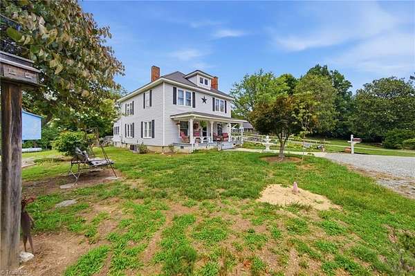 3.5 Acres of Land with Home for Sale in Ronda, North Carolina