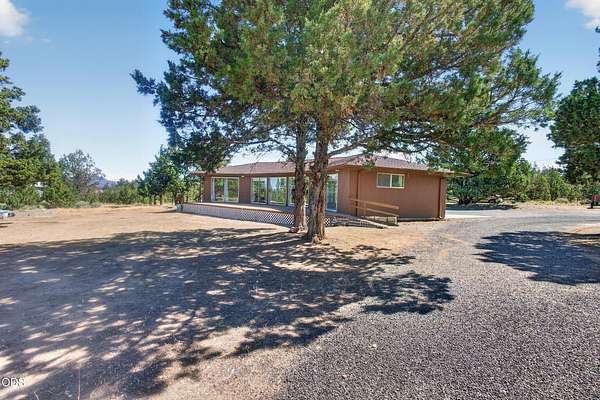 5 Acres of Land with Home for Sale in Powell Butte, Oregon