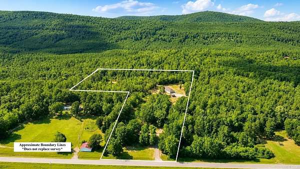 9.8 Acres of Land with Home for Sale in Perryville, Arkansas