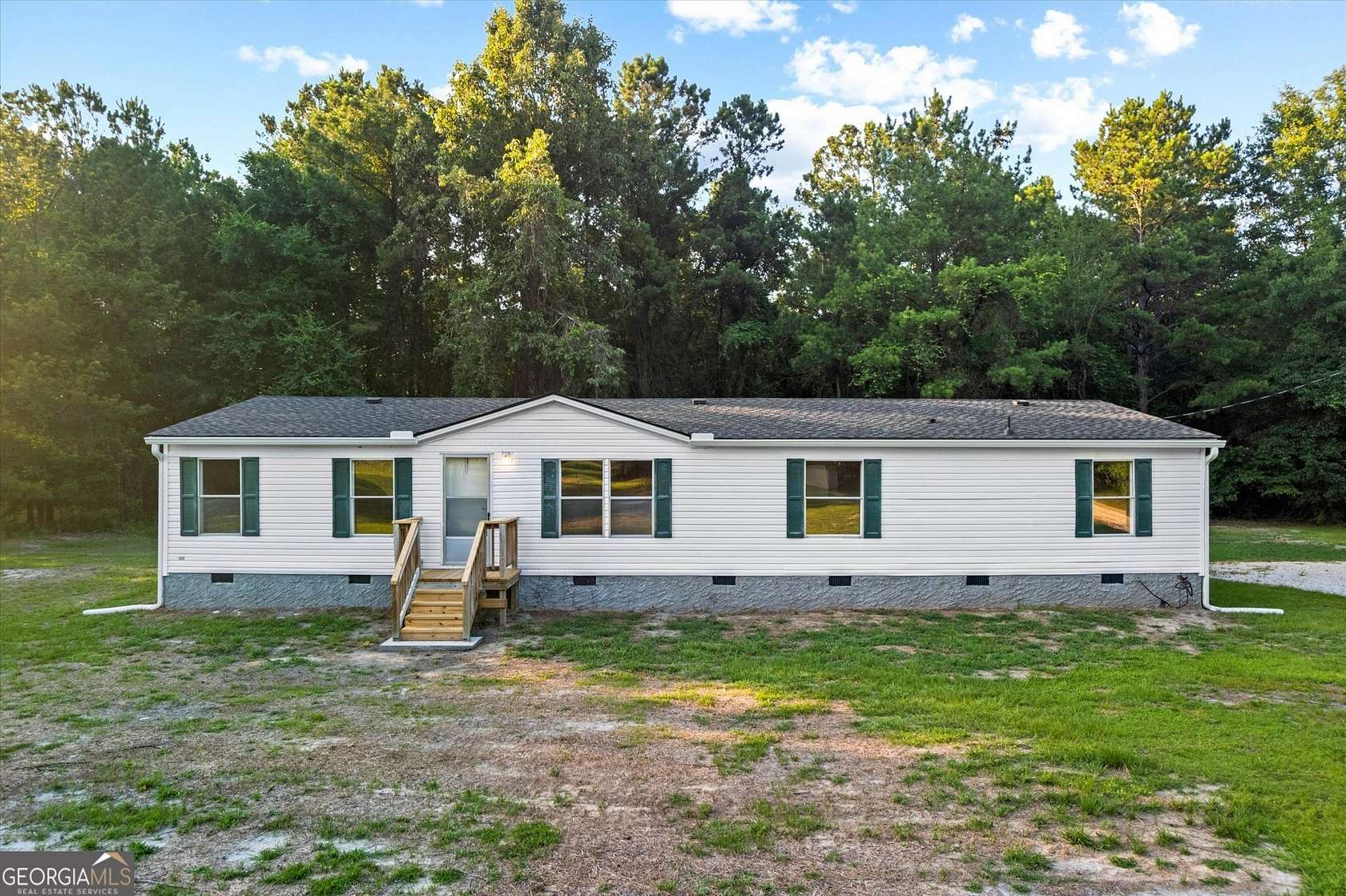 1.52 Acres of Land with Home for Sale in Byron, Georgia