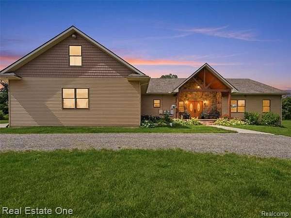 5 Acres of Land with Home for Sale in Holly Township, Michigan