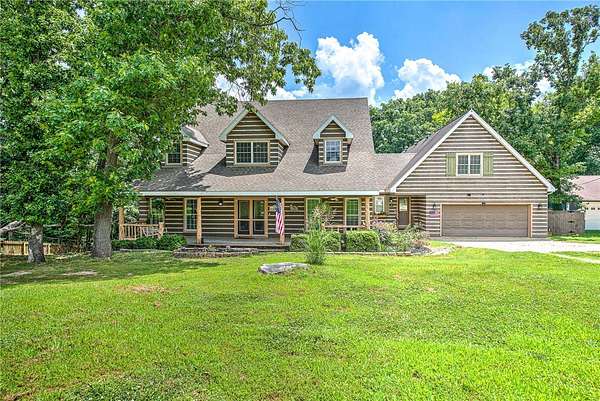 2.67 Acres of Land with Home for Sale in Rogers, Arkansas
