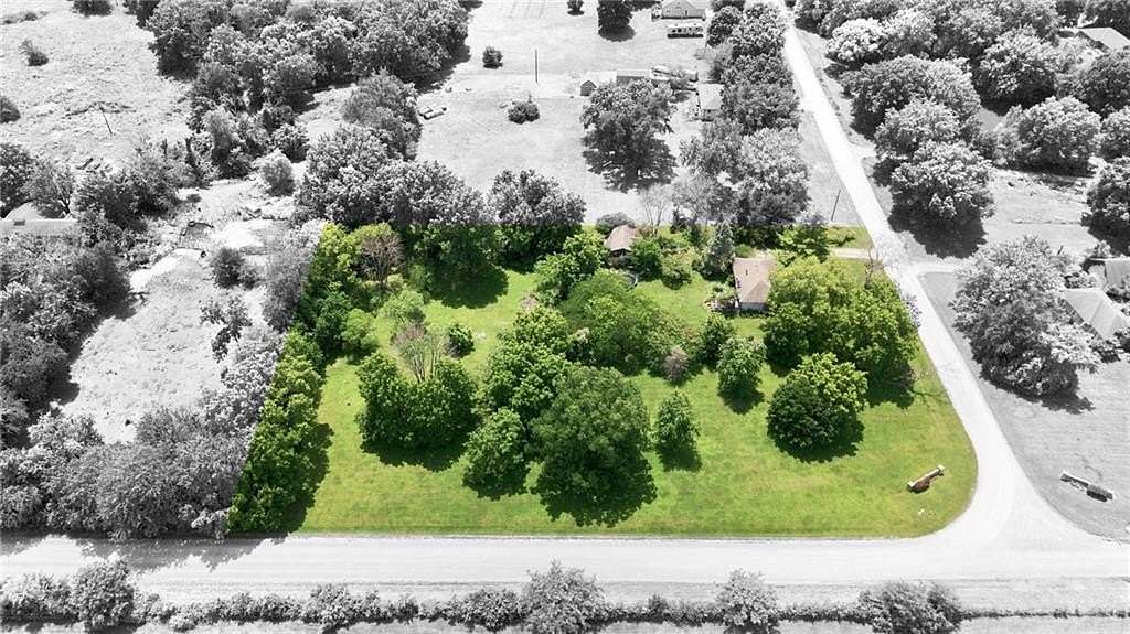 2.5 Acres of Land with Home for Sale in Peculiar, Missouri