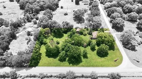 2.5 Acres of Land with Home for Sale in Peculiar, Missouri