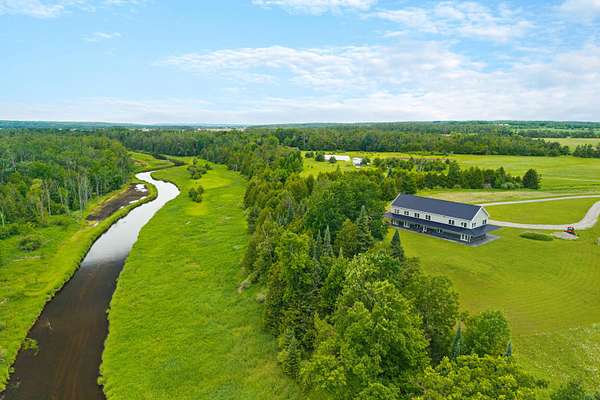 80 Acres of Land with Home for Sale in Herron, Michigan