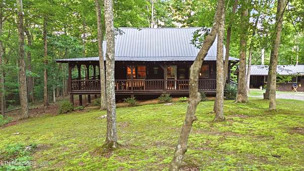 6.84 Acres of Land with Home for Sale in Oneida, Tennessee