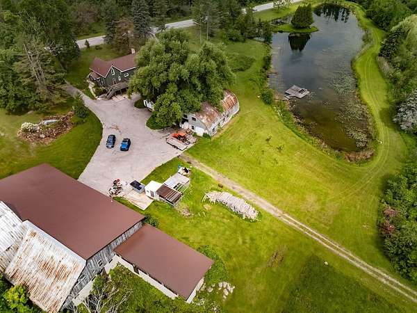 103 Acres of Land with Home for Sale in Hawks, Michigan