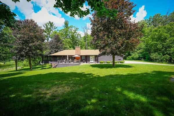 33 Acres of Recreational Land with Home for Sale in Howard City, Michigan