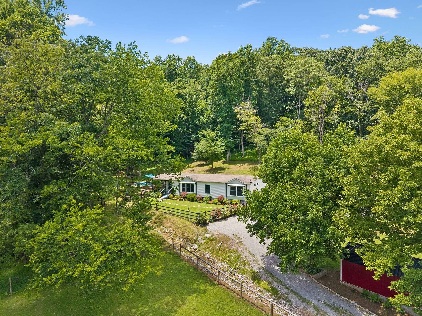 10.4 Acres of Recreational Land with Home for Sale in Mount Pleasant, Tennessee