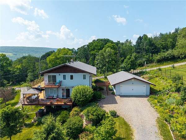 2.73 Acres of Land with Home for Sale in Middlesex, New York