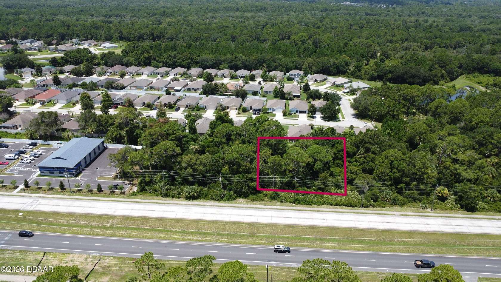 0.59 Acres of Commercial Land for Sale in Edgewater, Florida