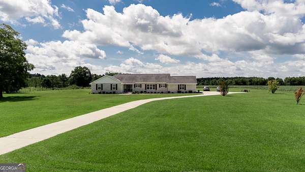 33.8 Acres of Land with Home for Sale in Fitzgerald, Georgia