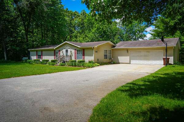 4.62 Acres of Land with Home for Sale in Howard City, Michigan