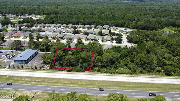 0.61 Acres of Commercial Land for Sale in Edgewater, Florida