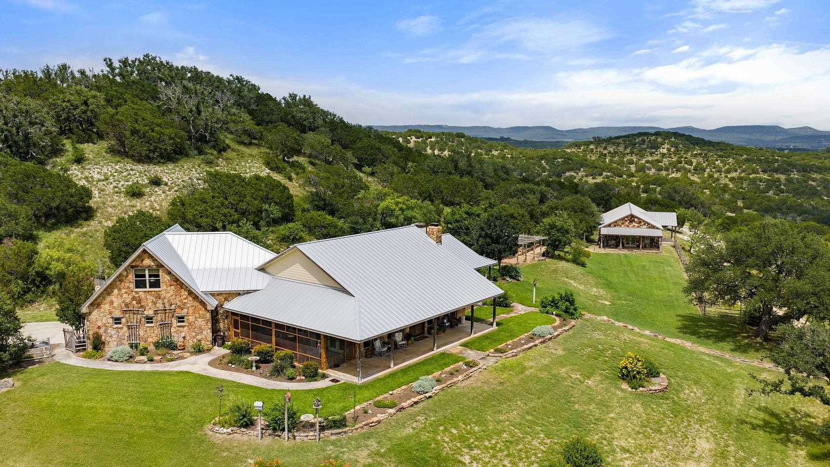 143 Acres of Agricultural Land with Home for Sale in Marble Falls, Texas