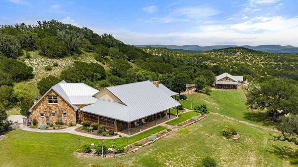 143 Acres of Agricultural Land with Home for Sale in Marble Falls, Texas