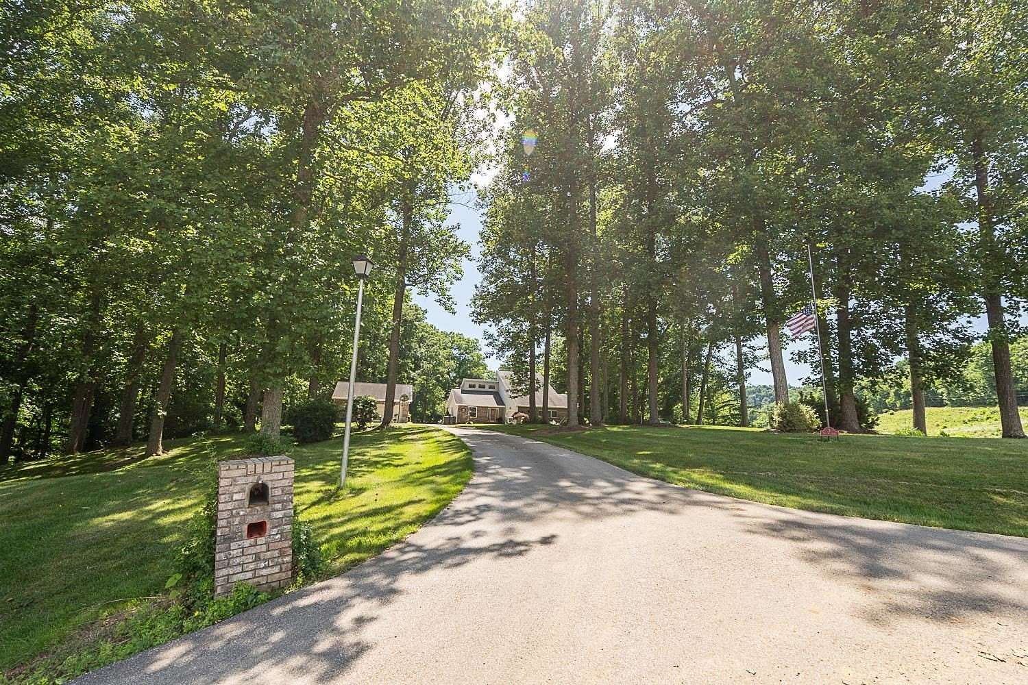 6.6 Acres of Land with Home for Sale in Chesapeake, Ohio