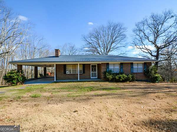 74.6 Acres of Land with Home for Sale in Ellijay, Georgia