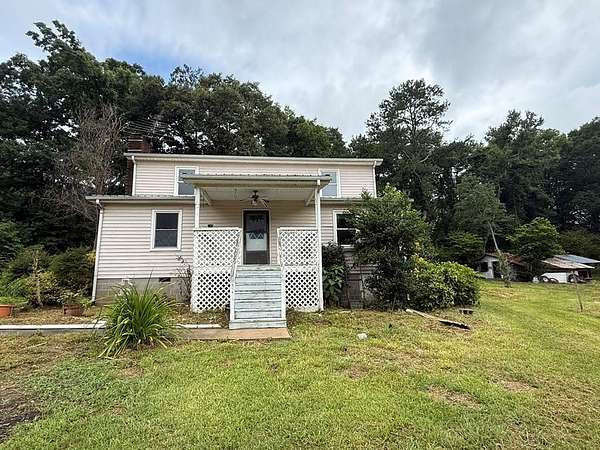5.46 Acres of Land with Home for Sale in Bowdon, Georgia