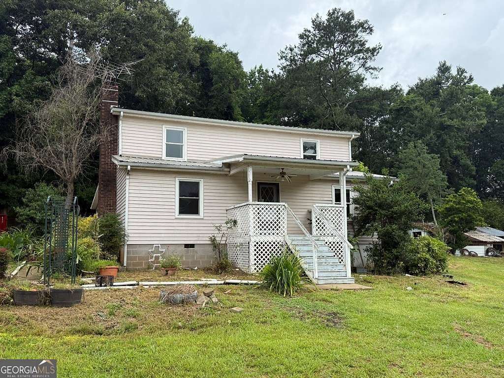 6 Acres of Land with Home for Sale in Bowdon, Georgia