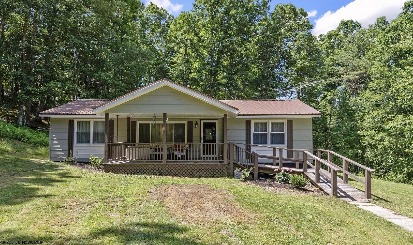 5.57 Acres of Land with Home for Sale in Dunmore, West Virginia
