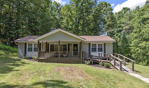 5.57 Acres of Land with Home for Sale in Dunmore, West Virginia