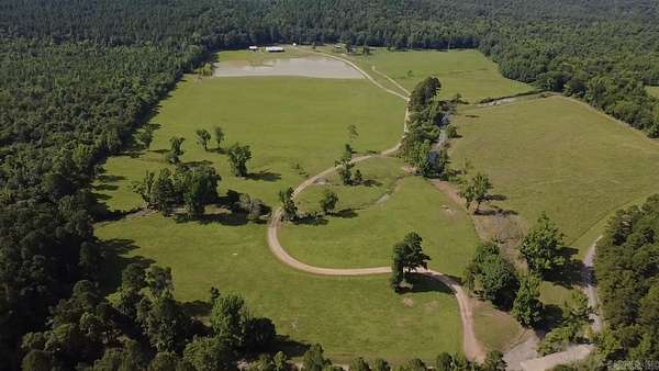 80 Acres of Land with Home for Sale in Waldron, Arkansas