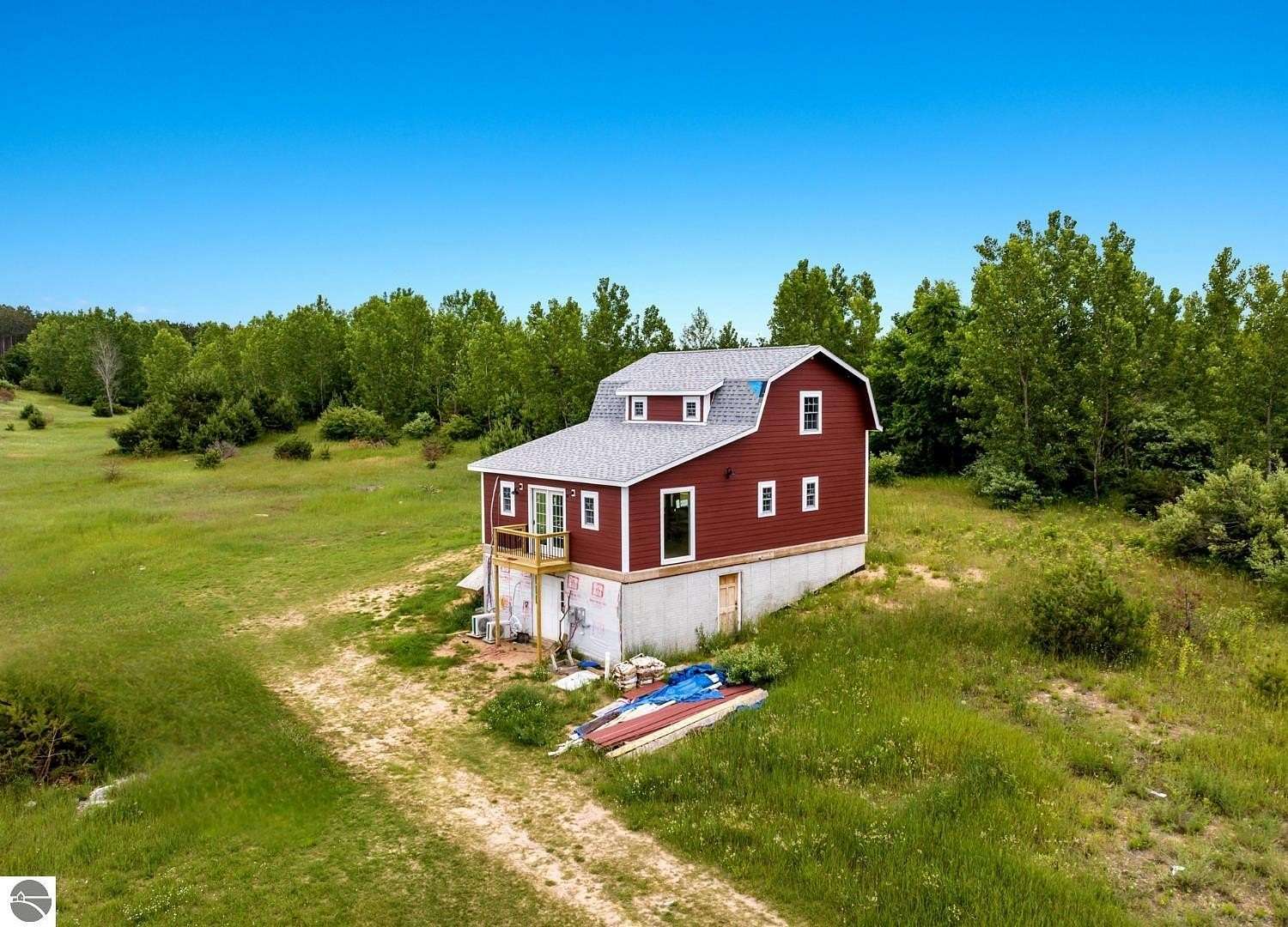 11.6 Acres of Recreational Land with Home for Sale in Bear Lake, Michigan