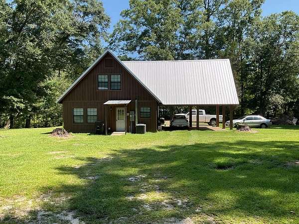 6.47 Acres of Land with Home for Sale in Brantley, Alabama