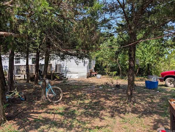 6 Acres of Land with Home for Sale in Booneville, Arkansas