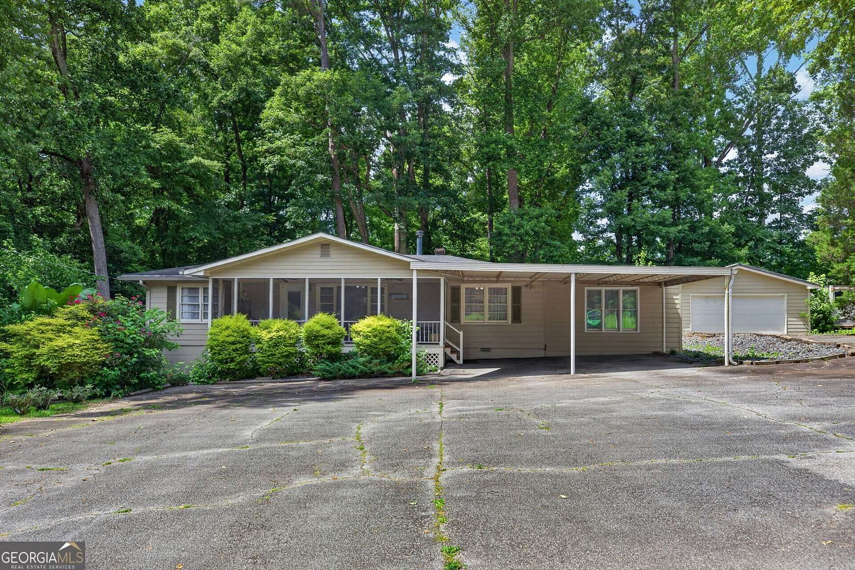 2.46 Acres of Land with Home for Sale in Powder Springs, Georgia
