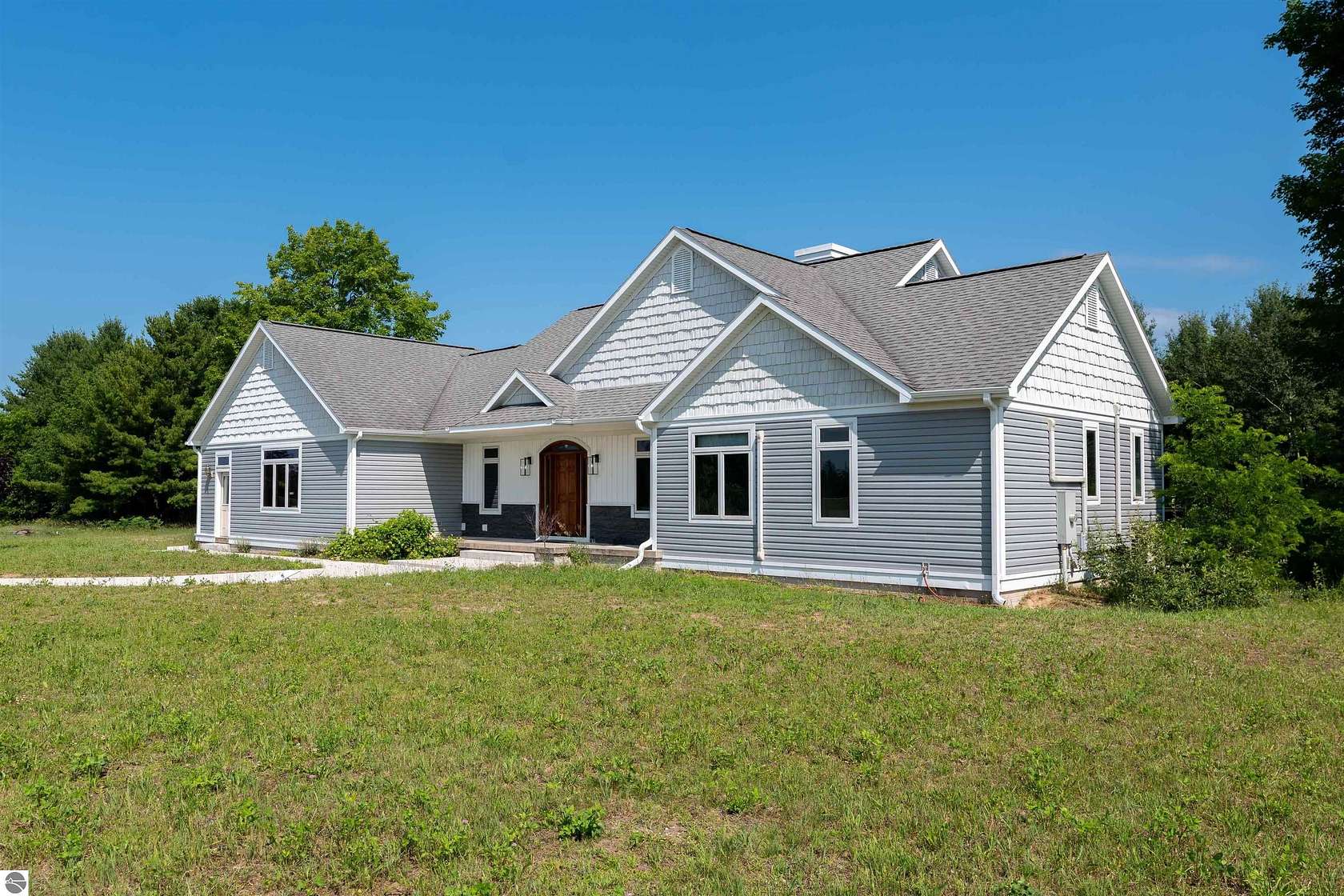 13 Acres of Land with Home for Sale in Williamsburg, Michigan