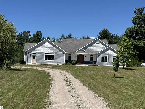 13 Acres of Land with Home for Sale in Williamsburg, Michigan