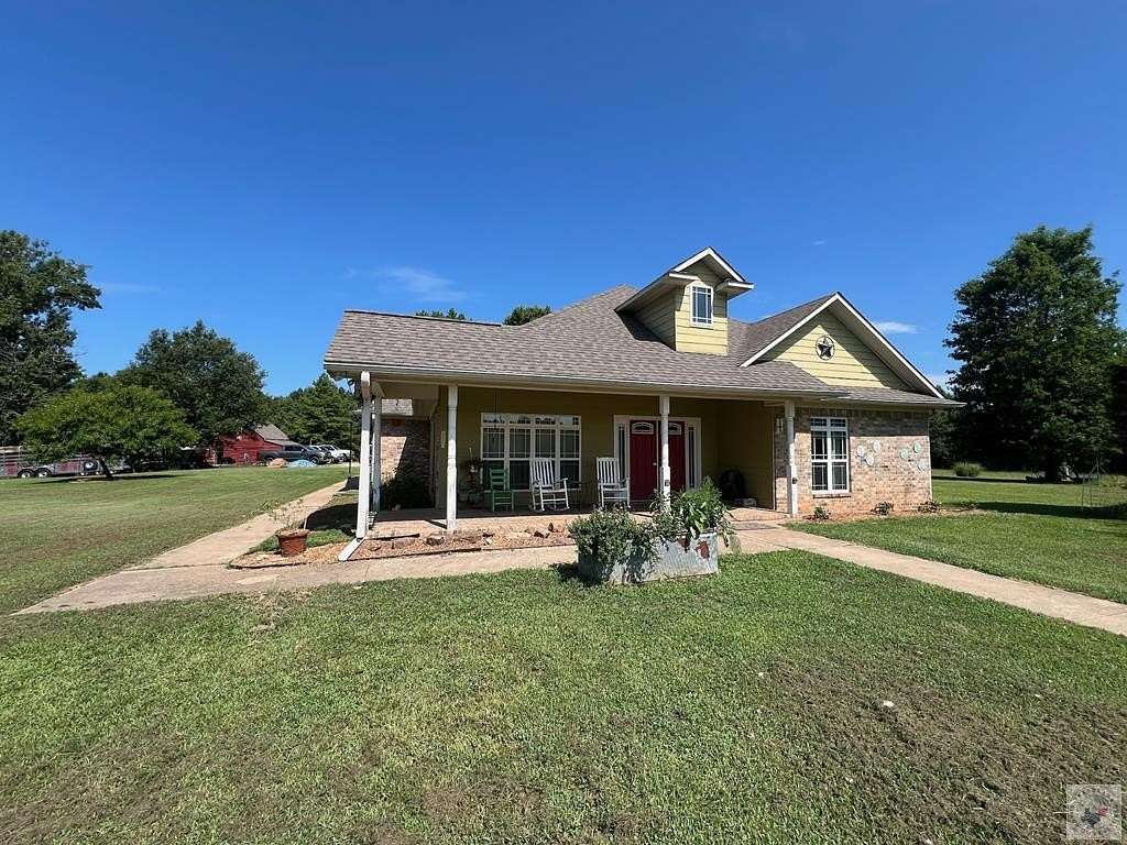 36.3 Acres of Agricultural Land with Home for Sale in De Kalb, Texas