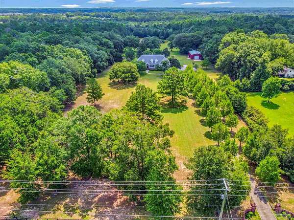 9.34 Acres of Land with Home for Sale in Cantonment, Florida