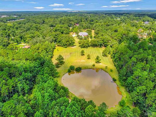 9.34 Acres of Land with Home for Sale in Cantonment, Florida