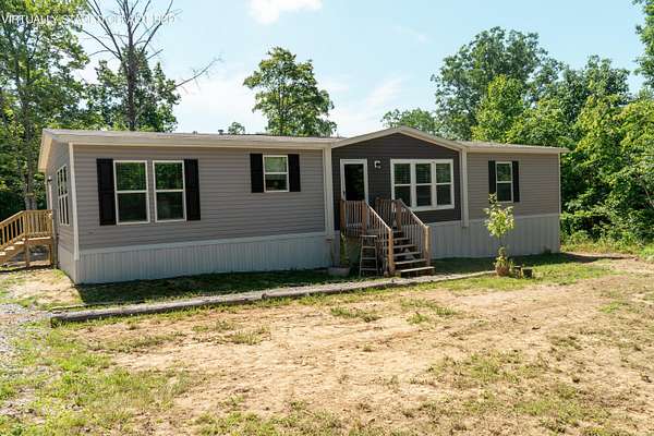 4.48 Acres of Land with Home for Sale in Dunlap, Tennessee