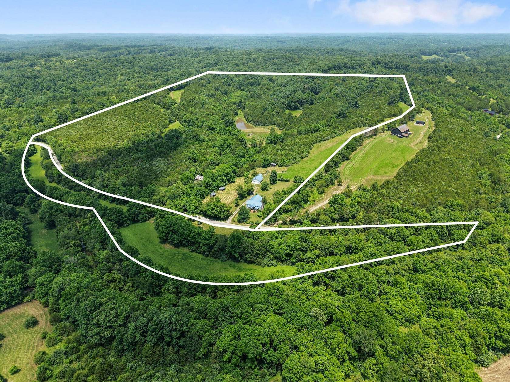 69.8 Acres of Land with Home for Sale in Stamping Ground, Kentucky