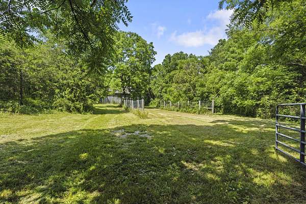 69.8 Acres of Land with Home for Sale in Stamping Ground, Kentucky