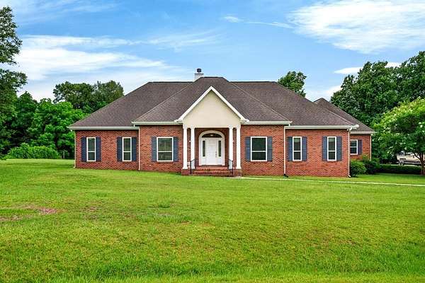 1.5 Acres of Land with Home for Sale in Carriere, Mississippi