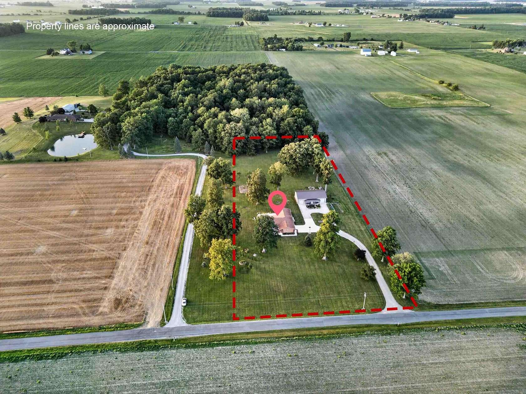 4 Acres of Land with Home for Sale in Jackson Center, Ohio