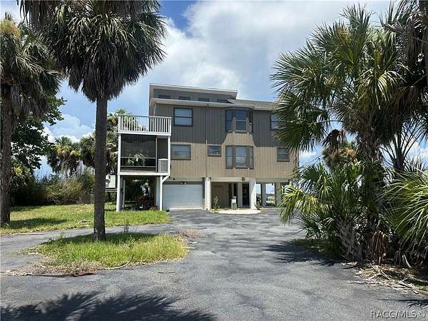 2.3 Acres of Land with Home for Sale in Crystal River, Florida