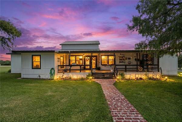 7.48 Acres of Land with Home for Sale in Mathis, Texas